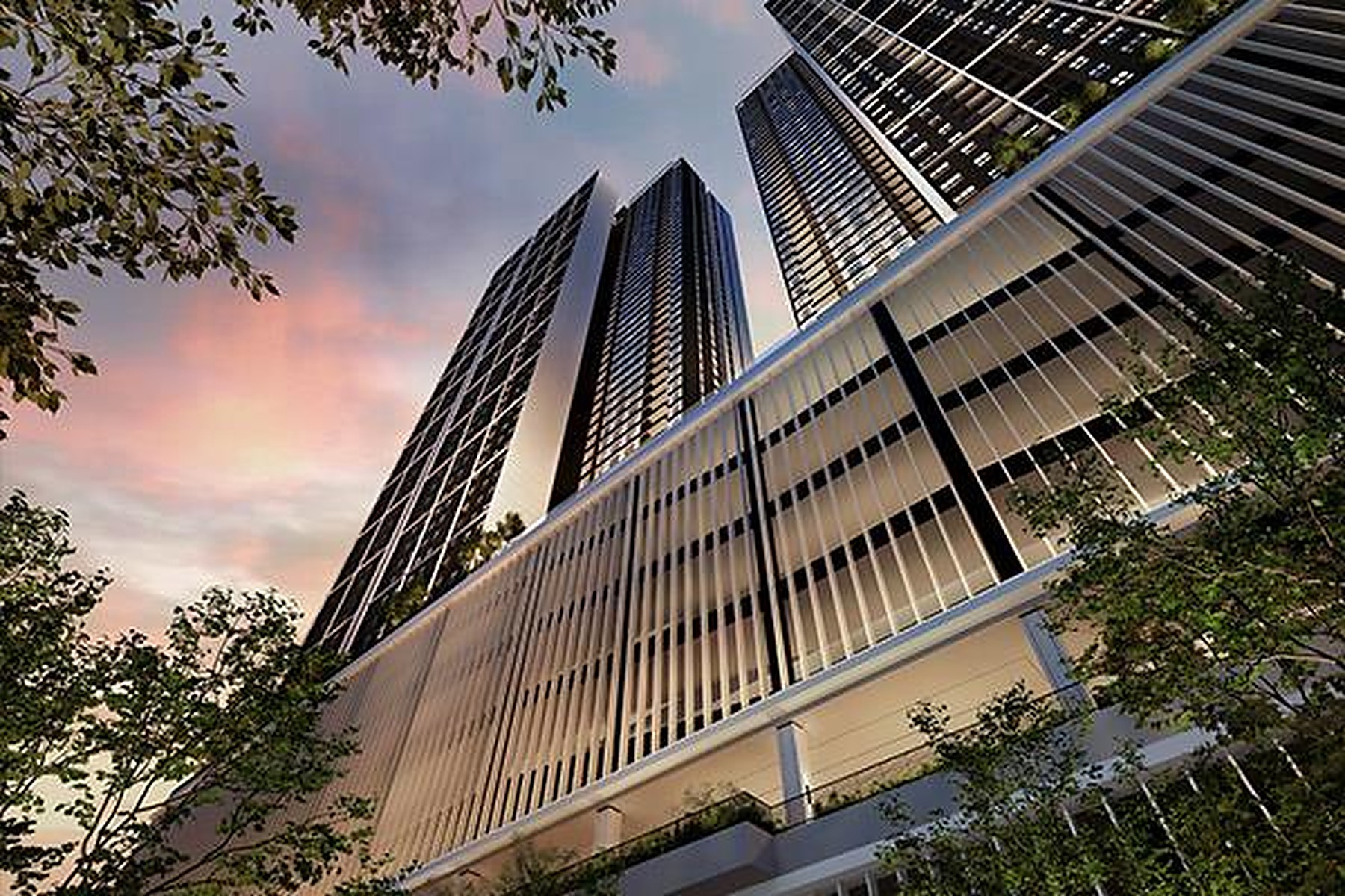 Aras Residences twin towers rising above Old Klang Road, Kuala Lumpur, at dusk